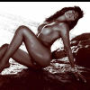 Vicky Barcelona stripper posing in a semi nude sensual position on a rock